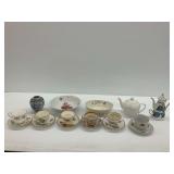 Teacups, Saucers, Bowls, Vase, and Teapots