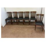 Six Wooden Chairs with Black Upholstery