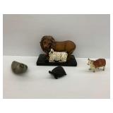 Five Figural Sculptures Including an Eskimo Art Sculpture