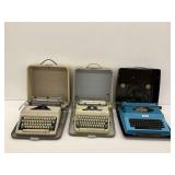 Three Portable Typewriters