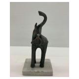 Elephant Sculpture on Stone Base