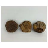 Three Leather Baseball Catchers Mitts