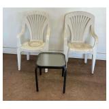 Two White Plastic Chairs and Black Metal End Table