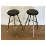Two Metal Bar Stools with Black Padded Seats