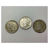 Three Peace Silver Dollars