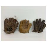 Three Vintage Leather Baseball Gloves