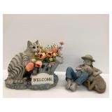 Two Figural Decorative Statues