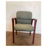 Upholstered Armchair with Wooden Frame