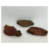 Three Baseball Gloves