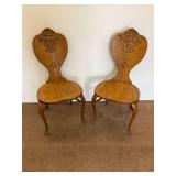 Two Vintage Wooden Chairs with Carved Details