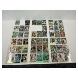 Binder Sheets of Reggie White Assorted Football Cards...see photos