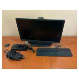 Dell Computer Monitor with Logitech Keyboard and Docking Station