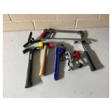 Mixed Assortment of Hand Tools Including Hammers, Pipe Wrench, Tubing Cutters, and Hacksaw