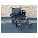 Invacare Tracer IV Heavy Duty Wheelchair with Elevating Leg Rests ... 24 x 18 Inch Seat
