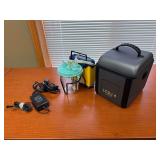 Laerdal Compact Suction Unit 4 (LCSU 4) with Carrying Case and Power Supply