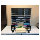 Modular Literature Sorters with Office Supplies and Paper