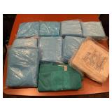 Assorted Medical and Isolation Gowns in Protective Packaging