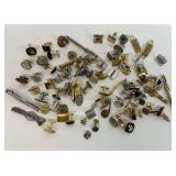 Pairs of Cufflinks and Tie Clips