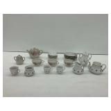 Various Porcelain Teapots, Cups, and Saucers