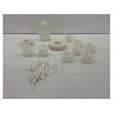 White Ceramic Tea Set with Plates and Utensils