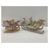 (2) Vintage Porcelain Sleigh Figurines with Figural Accents