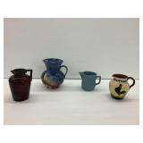 (4) Different Design Pottery Pitchers