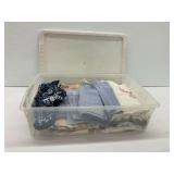 Textile Assortment with Linens and Garments in Plastic Storage Bin