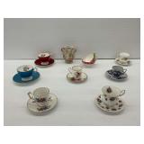 Porcelain Teacups and Saucers with Vase