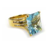 18K Yellow Gold, Blue Topaz, and Diamonds Ring... $4,950 Appraised Replacement Value