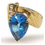 14K Yellow Gold Ring with Blue Topaz Stone and White Sapphires... $2,350 Appraisal Replacement Value.