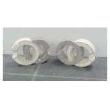 Pair of Decorative Interlocking C Letter Sculptures with Glitter Finish... can function as bases for glass top stands
