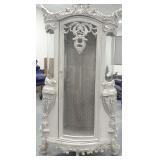 Ornately Carved Glass Door Curio Cabinet with Silver Color Finish... no shelves