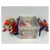 Plastic Storage Tub with Vintage Doll Clothes and Musical Clown Dolls