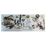 Costume Jewelry Lot with Necklaces, Bracelets, and Earrings
