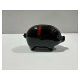 Ceramic Pig Bank... Black with Red Drip Glaze...has coins inside