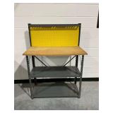 Workbench with Pegboard Backing and Storage Shelves