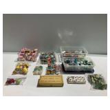 Group of Sewing Thread Spools and Needles