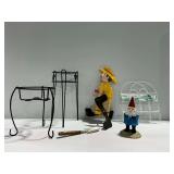 Garden Decor Items: Gnome, Trowel, Whirligig, and Wrought Iron Plant Stands