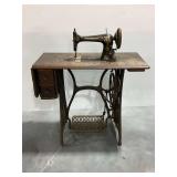 Singer Treadle Sewing Machine with Wooden Cabinet