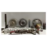 Automotive Parts and Tools Including Hubcaps and Tire Chains