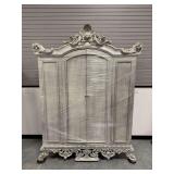 Elaborately Designed Silver Color Cabinet... needs restoration and is wrapped in plastic for protection and moving