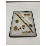 Assorted Costume Jewelry: Bracelets, Cufflinks, and Necklace