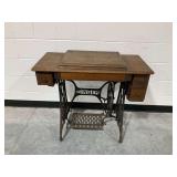 Singer Treadle Sewing Machine with Wooden Cabinet