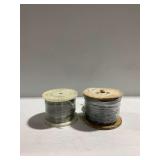 (2) Spools of Steel Cable with Plastic and Wooden Spools