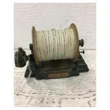 Antique cast iron ribbon dispenser