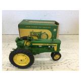 John Deere antique toy tractor with original box