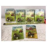 6 Hesston 1/64 scale tractors