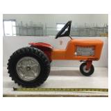 Buddy L plastic ride on tractor with metal seat,