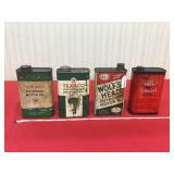 Three empty quart size motor oil cans and one