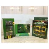Two John Deere tractor sets and one decorative